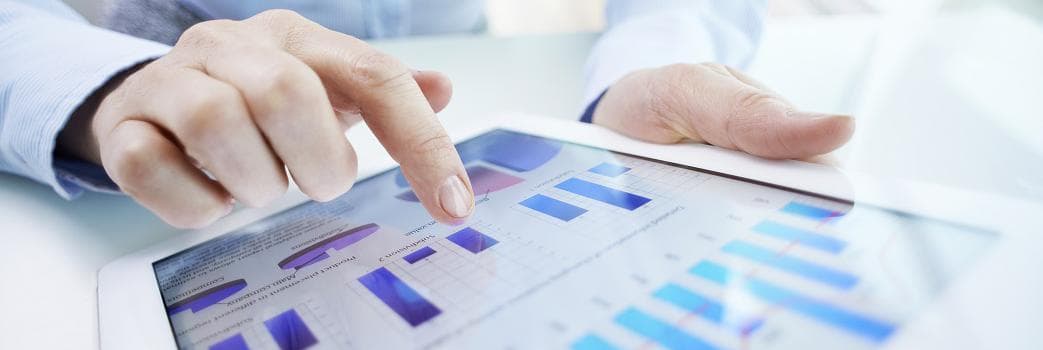 A professional interacting with a tablet